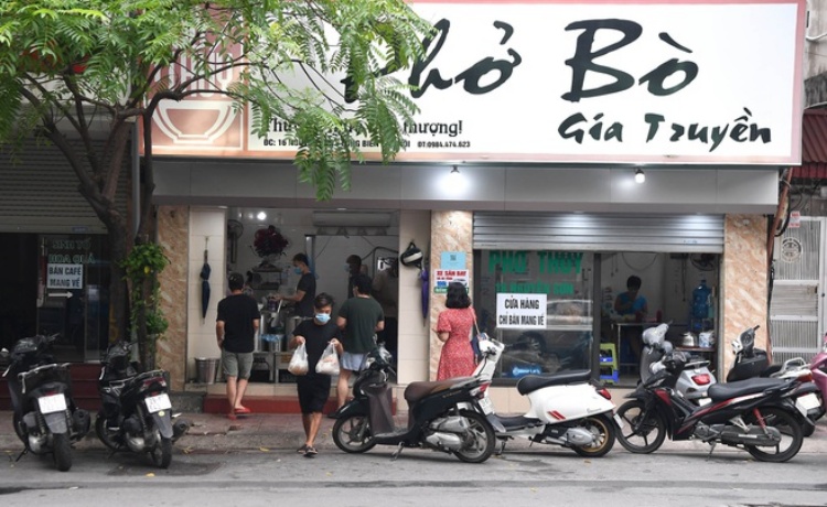 Hà Nội: Cho phép hàng quán ăn, văn phòng phẩm bán mang về từ 12h ngày 16/9 